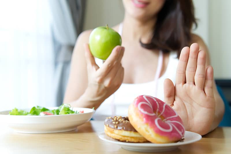 Woman Rejecting Carbs and Bitters